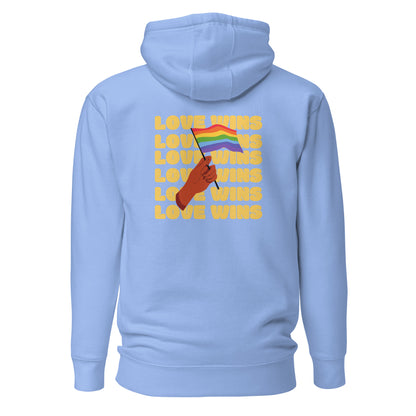 Carolina Blue hoodie, back view with a hand waving a rainbow flag over yellow "Love Wins" lettering.