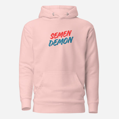 Light Pink hoodie with red and blue Semen Demon lettering, front view.