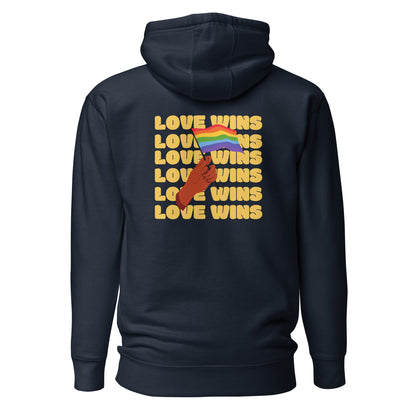 Navy Blazer hoodie, back view with a hand waving a rainbow flag over yellow "Love Wins" lettering.