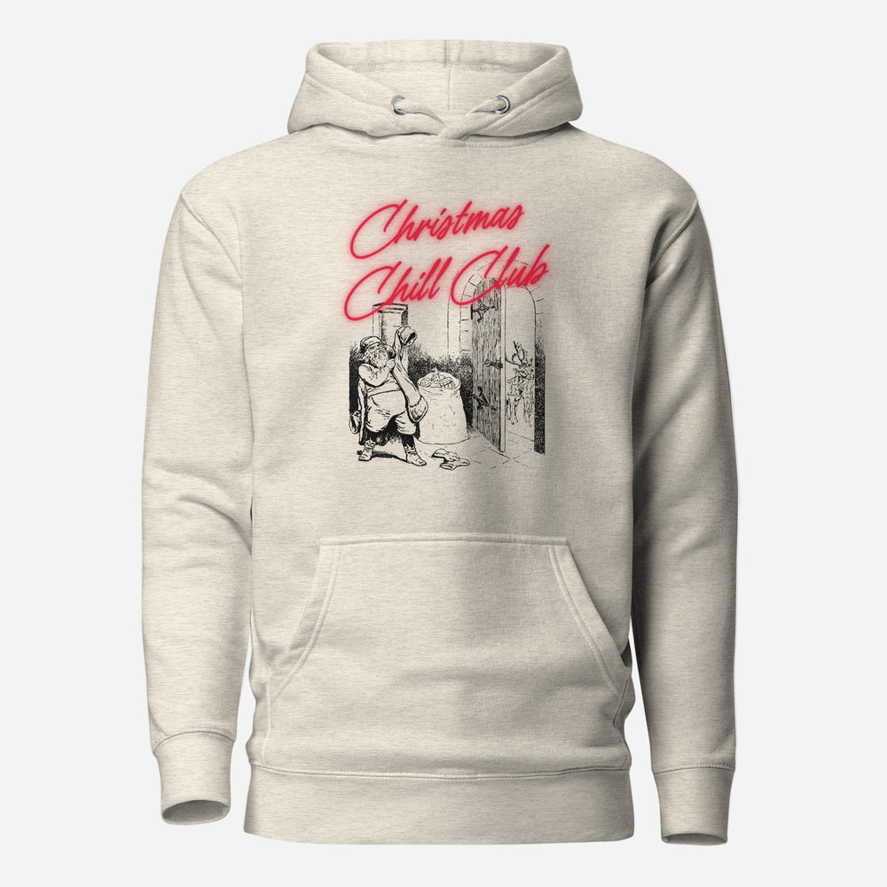 Oatmeal Heather hoodie, front view with a black-and-white Santa illustration and red "Christmas Chill Club" script.