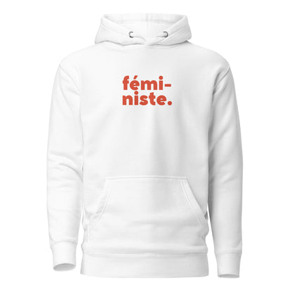 White hoodie, front view, with red stacked 'fémi-niste.' lettering.