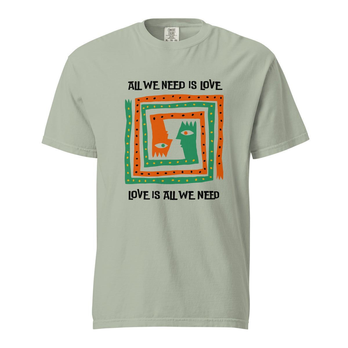 Bay T-shirt, front view, with orange and green abstract faces framed by 'All We Need Is Love' text.