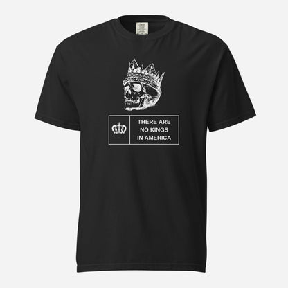 Black T-shirt, front view, with a white crowned skull above 'There Are No Kings In America' text.