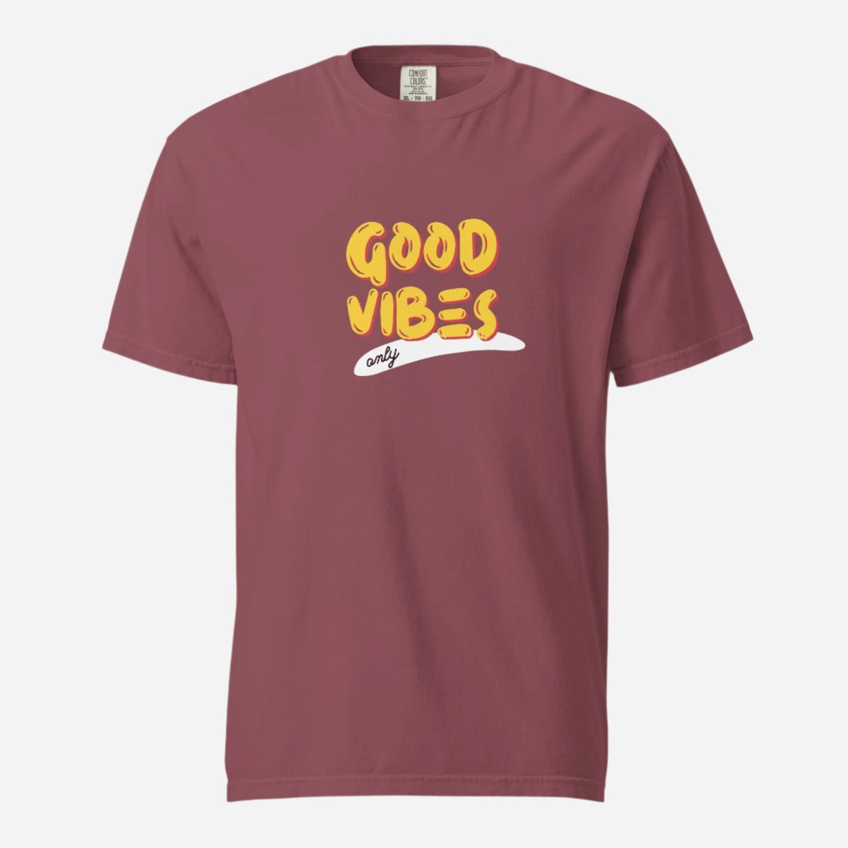Brick T-shirt, front view with yellow "Good Vibes" lettering and a white underline.