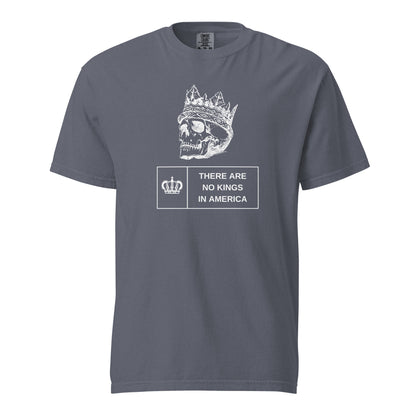 denim T-shirt, front view, with a white crowned skull above 'There Are No Kings In America' text.