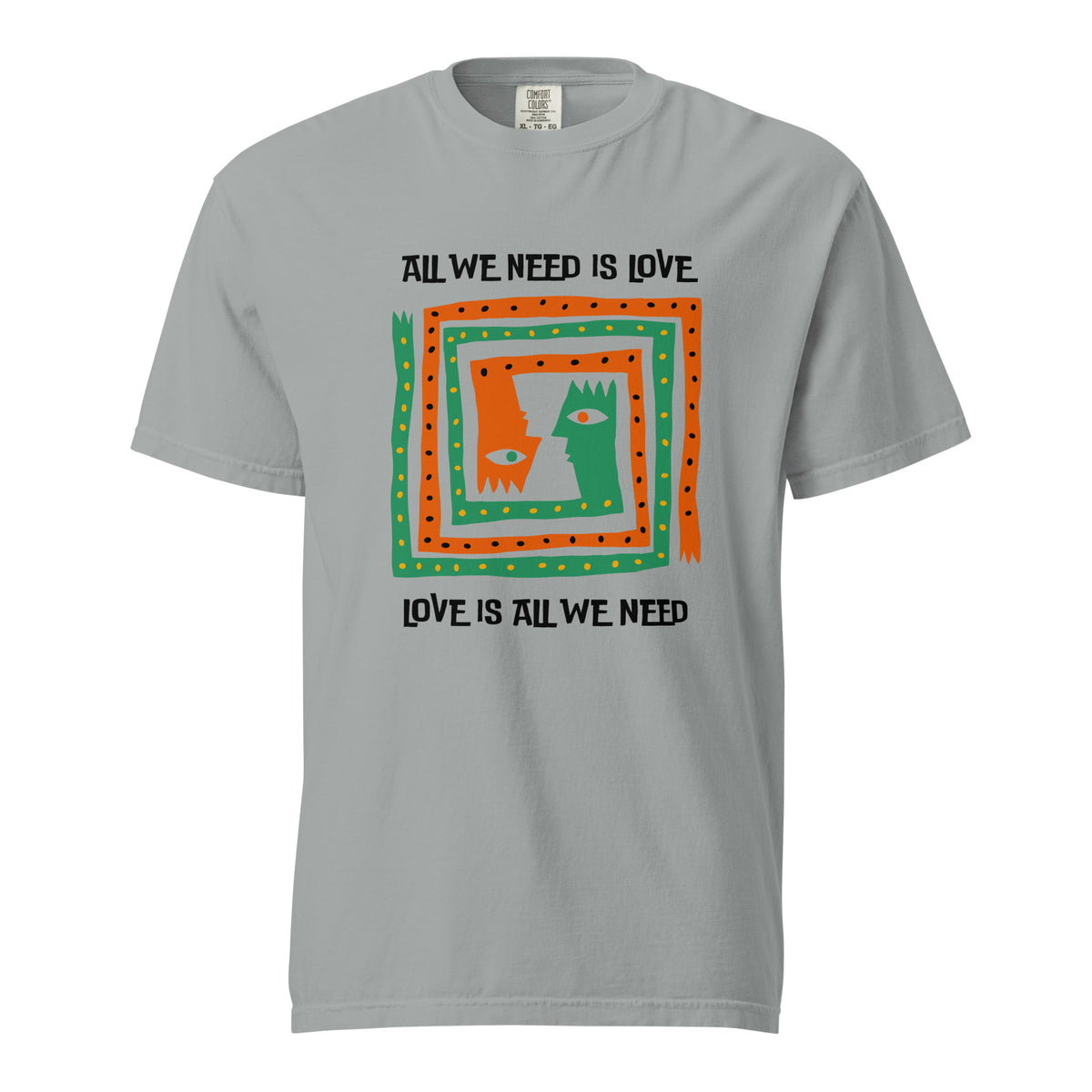 Granite T-shirt, front view, with orange and green abstract faces framed by 'All We Need Is Love' text.