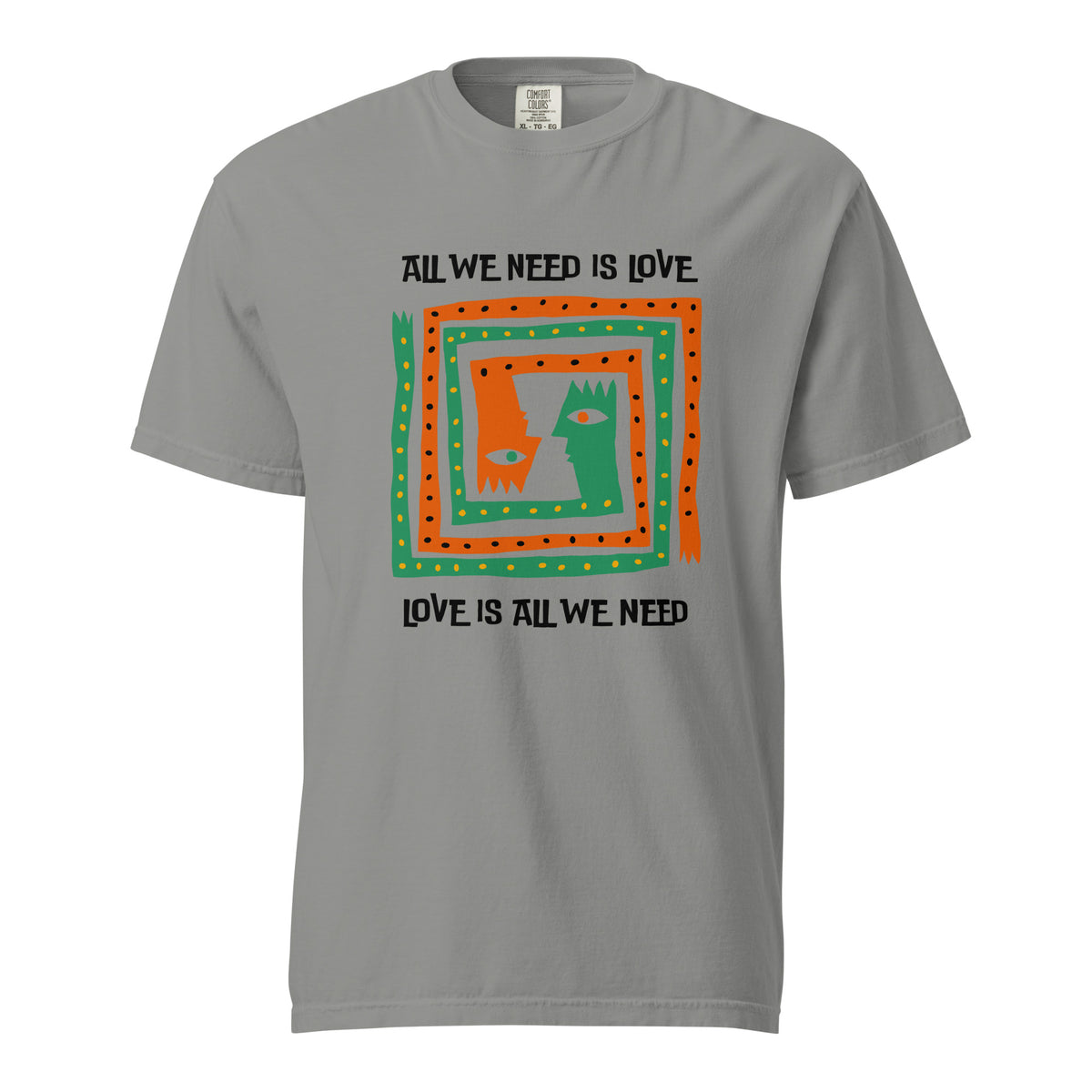 Grey T-shirt, front view, with orange and green abstract faces framed by 'All We Need Is Love' text.