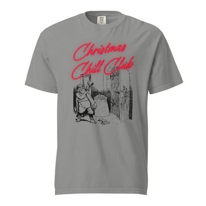 Grey T-shirt, front view, with a seated Santa illustration beneath red 'Christmas Chill Club' script.