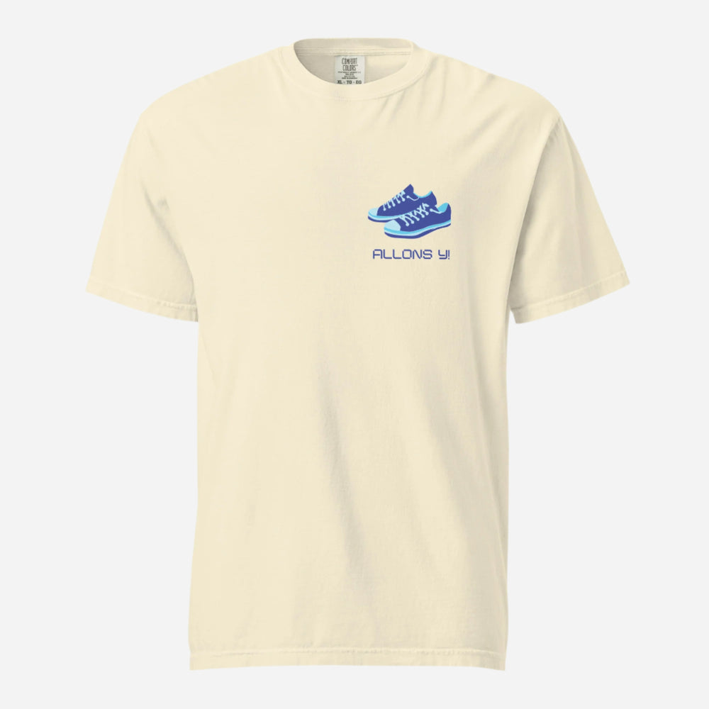 Ivory T-shirt, front view with blue sneakers and "Allons Y" chest lettering.