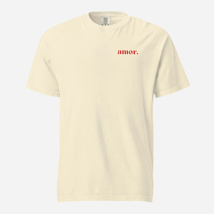 Ivory T-shirt, front view, with small red 'amor.' lettering on the chest.