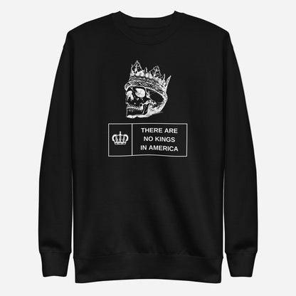 Black sweatshirt, front view with a white crowned skull and "There Are No Kings in America" lettering.