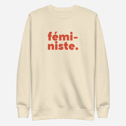 Bone sweatshirt with red fémi-niste lettering, front view.