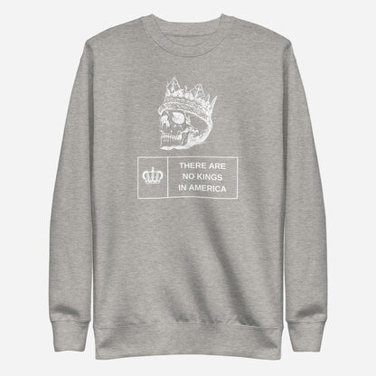 Carbon Grey sweatshirt, front view with a white crowned skull and "There Are No Kings in America" lettering.