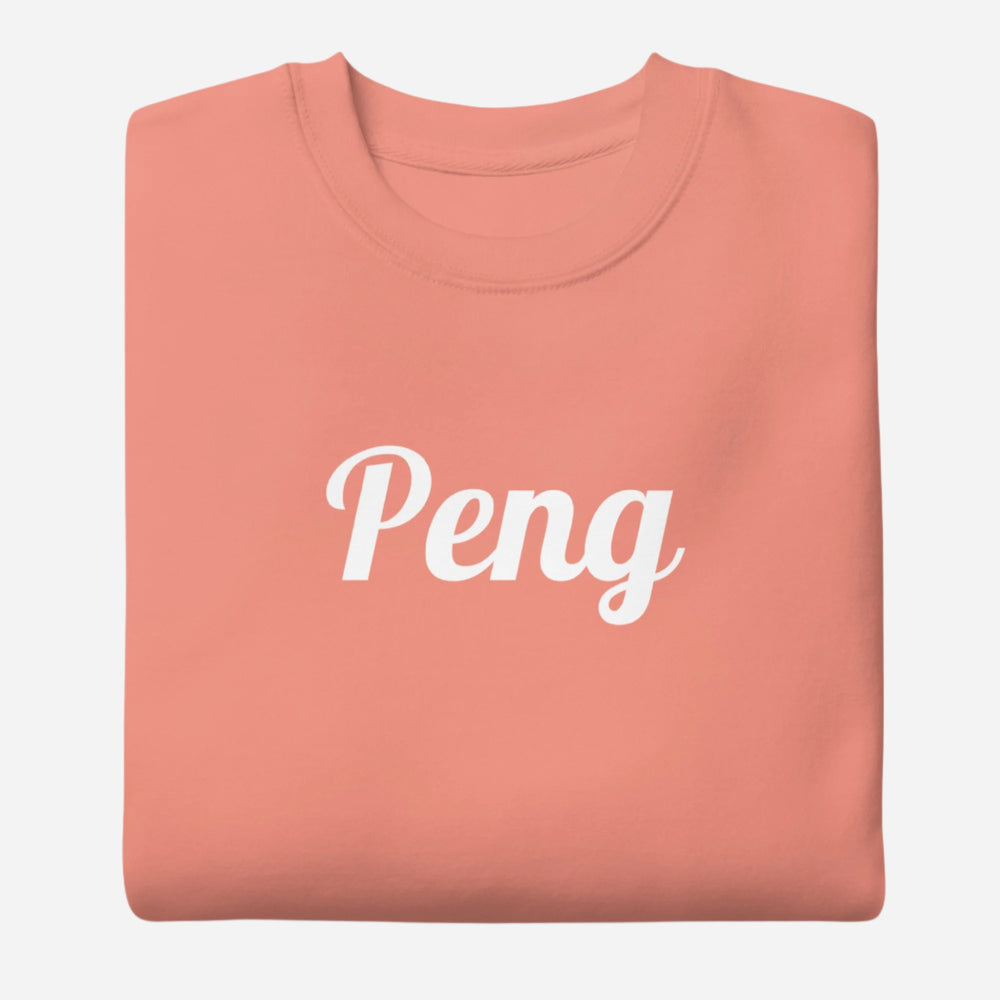 Folded Dusty Rose sweatshirt, showing white "Peng" script.