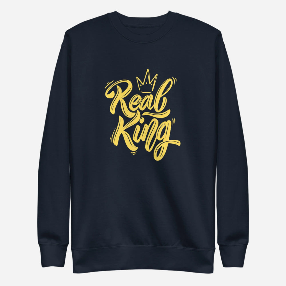 Navy Blazer sweatshirt, front view with yellow "Real King" script and a crown graphic.